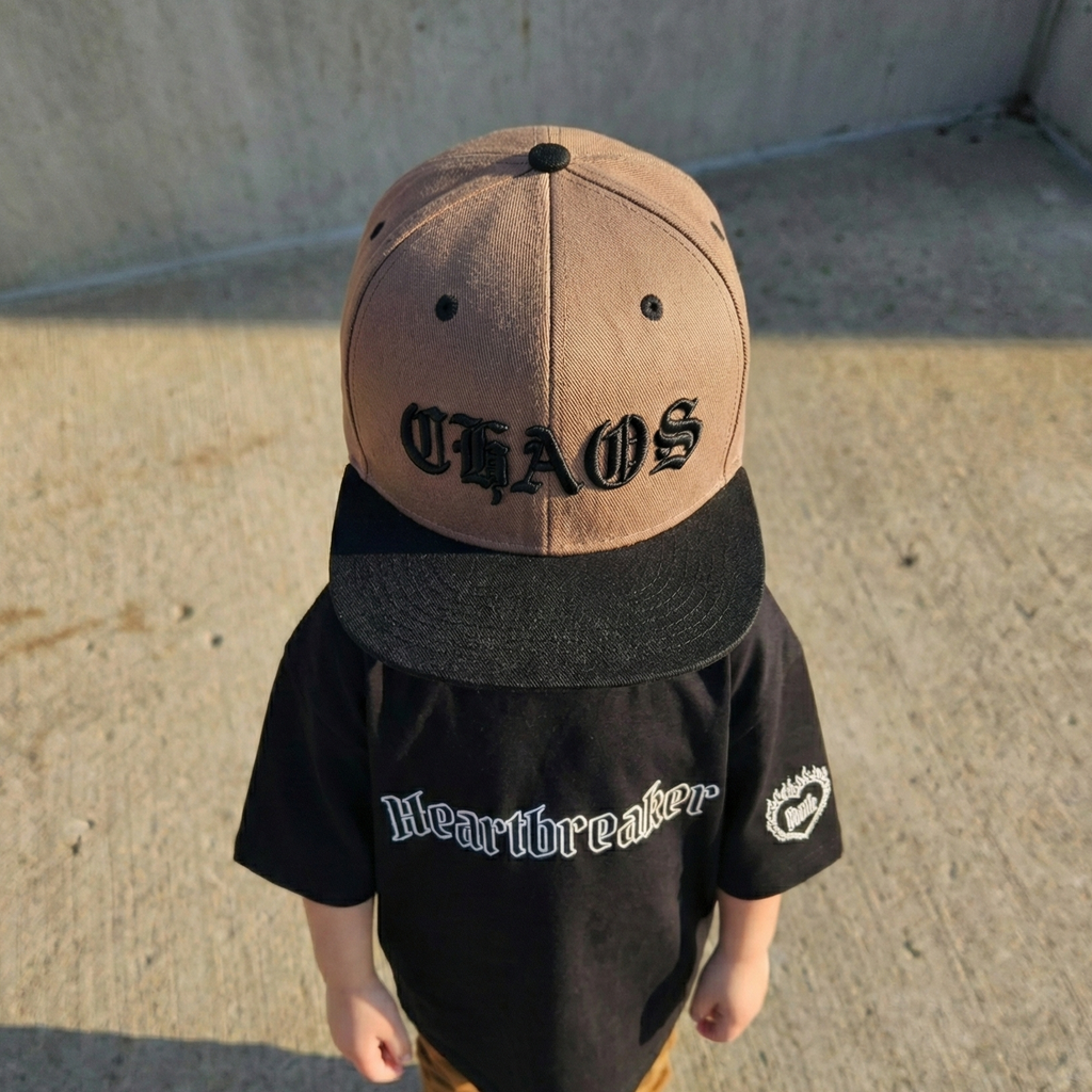 dad ans son matching snapback cap on kid 